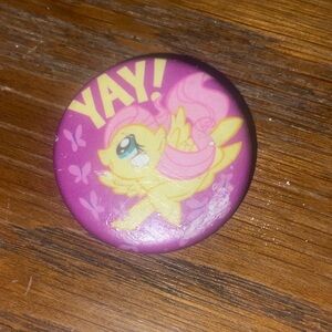 Y2K hot topic vintage purple + yellow mlp fluttershy button pin